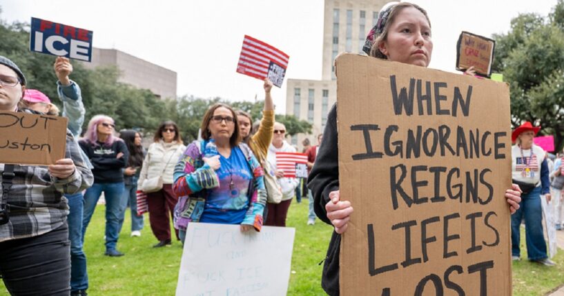 Women's March Network protesters against President Donald Trump are pictured during a Jan. 20 demonstration outside Houston City Hall in Houston, Texas.