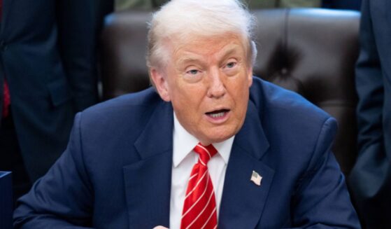 President Donald Trump speaks with the media after signing a funding bill to end a partial government shutdown in the Oval Office of the White House in Washington, D.C., on Feb. 3, 2026.
