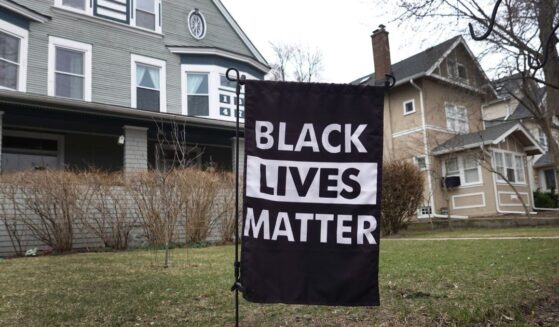 A Black Lives Matter sign sits in front of a home on March 23, 2021, in Evanston, Illinois.