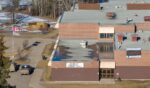 An aerial view of the middle school and high school building where a shooting took place, leaving at least nine people dead in the small town of Tumbler Ridge, British Columbia, on Feb. 11, 2026.