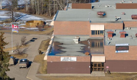 An aerial view of the middle school and high school building where a shooting took place, leaving at least nine people dead in the small town of Tumbler Ridge, British Columbia, on Feb. 11, 2026.