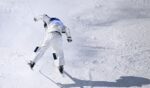 Ikuma Horishima of Team Japan lands after crashing as he competes in the Men's Dual Moguls 1/8 Finals against Nick Page of Team United States on day nine of the Milano Cortina 2026 Winter Olympic games at Livigno Air Park on Feb. 15, 2026, in Livigno, Italy.
