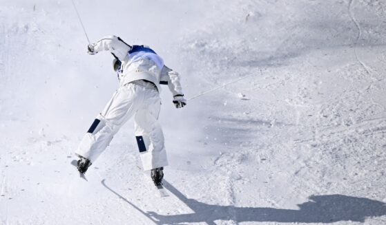 Ikuma Horishima of Team Japan lands after crashing as he competes in the Men's Dual Moguls 1/8 Finals against Nick Page of Team United States on day nine of the Milano Cortina 2026 Winter Olympic games at Livigno Air Park on Feb. 15, 2026, in Livigno, Italy.