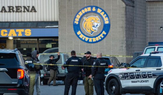 Police stand outside the perimeter they created around the Dennis M. Lynch Arena where a shooting occurred earlier today in Pawtucket, Rhode Island, on Feb. 16, 2026.