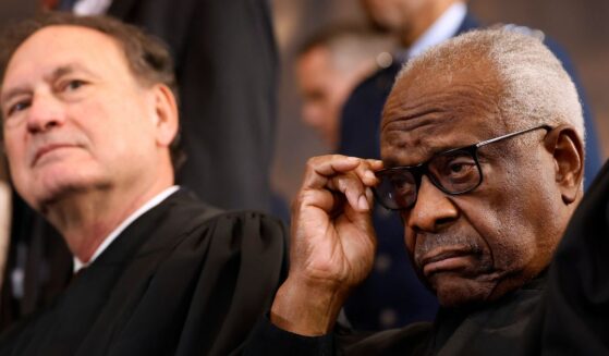 Supreme Court Associate Justices Samuel Alito and Clarence Thomas wait for their opportunity to leave the stage at the conclusion of the inauguration ceremonies in the Rotunda of the U.S. Capitol on Jan. 20, 2025, in Washington, D.C.