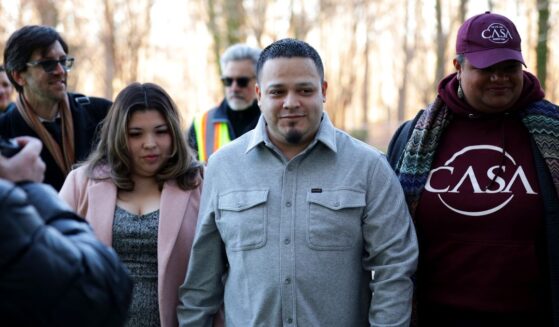 Kilmar Abrego Garcia arrives with his wife Jennifer Vasquez Sura and his attorney Simon Sandoval-Moshenberg at U.S. District Court for the District of Maryland on Dec. 22, 2025, in Greenbelt, Maryland.