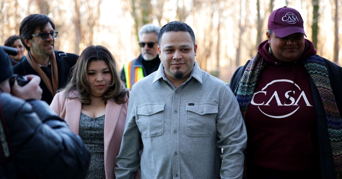 Kilmar Abrego Garcia arrives with his wife Jennifer Vasquez Sura and his attorney Simon Sandoval-Moshenberg at U.S. District Court for the District of Maryland on Dec. 22, 2025, in Greenbelt, Maryland.
