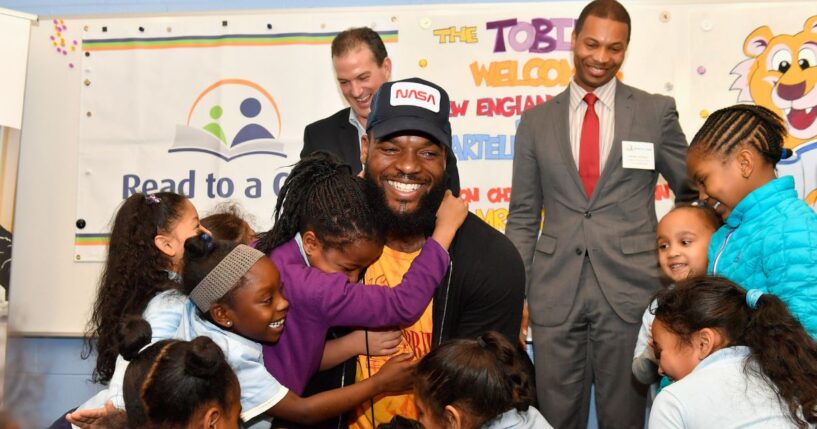 Martellus Bennett visits Read to a Child's Lunchtime at Boston Public Schools' Tobin K-8 and reads his new book "Hey A.J., It's Saturday!" to first and second graders on Nov. 15, 2016, in Roxbury, Massachusetts.