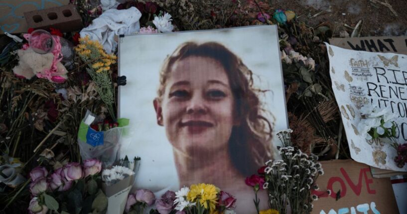 A picture of Renee Good is covered with flowers at a memorial on Jan. 29, 2026, in Minneapolis, Minnesota.