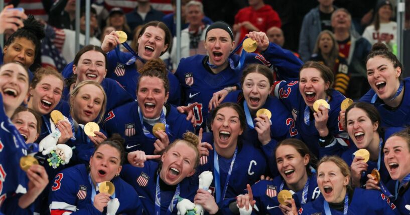 Gold medalist Team United States pose after the medal ceremony for the Ice Hockey Women following the Women's Gold Medal match between the United States and Canada on day 13 of the Milano Cortina 2026 Winter Olympic games at Milano Santagiulia Ice Hockey Arena on Feb. 19, 2026, in Milan, Italy.