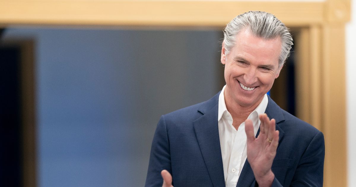 California Gov. Gavin Newsom applauds during an event hosted by the South Carolina Democratic Party at the Carter-Sullivan American Legion on Feb. 23, 2026, in Manning, South Carolina.