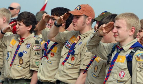 U.S. Boy Scouts are seen saluting while listening to their country's anthem in a file photo dated April 16, 2011.