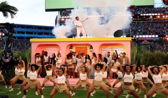Bad Bunny performs onstage during Sunday's Super Bowl LX Halftime Show. Viewership data indicates millions tuned out when the raunchy rapper's show started.