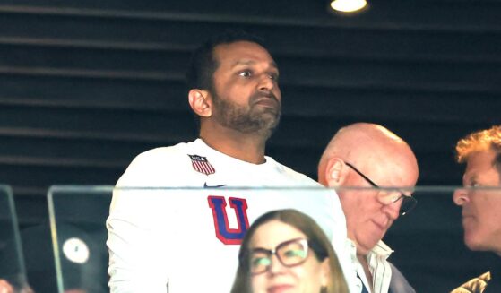 Federal Bureau of Investigation Director Kash Patel looks on prior to the men's gold medal hockey match between Canada and the United States Sunday on day 16 of the Milano Cortina 2026 Winter Olympic games in Milan, Italy.