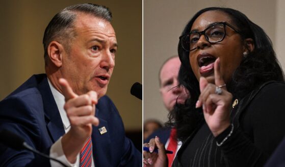 Rep. LaMonica McIver, right, a New Jersey Democrat, posed a theological question to acting Director of U.S. Immigration and Customs Enforcement Todd Lyons, left, during a House Homeland Security Committee hearing on Tuesday in Washington, D.C.