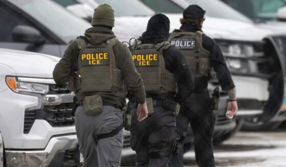 ICE agents leave the Bishop Henry Whipple Federal Building in Minneapolis, Minnesota, on Feb. 4, 2026.