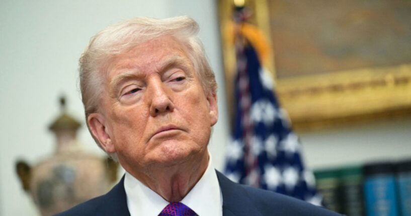 President Donald Trump looks on as he makes an announcement in the Roosevelt Room of the White House in Washington, DC on Feb. 12, 2026.