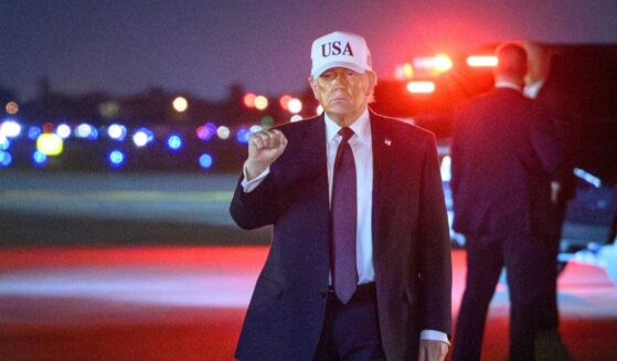 President Donald Trump pumps his fist at Palm Beach International Airport in West Palm Beach, Florida, on Feb. 27, 2026.