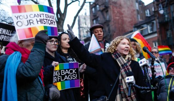 Stonewall Inn owner Stacy Lentz speaks Tuesday during a protest in front of the Stonewall Monument in Manhattan in New York, after the National Park Service ordered the removal of a gay "pride" flag at the site.