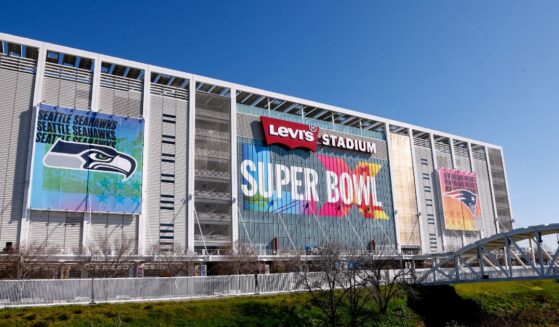 Seattle Seahawks and New England Patriots banners are displayed at Levi's Stadium in advance of Sunday's Super Bowl LX in Santa Clara, California.