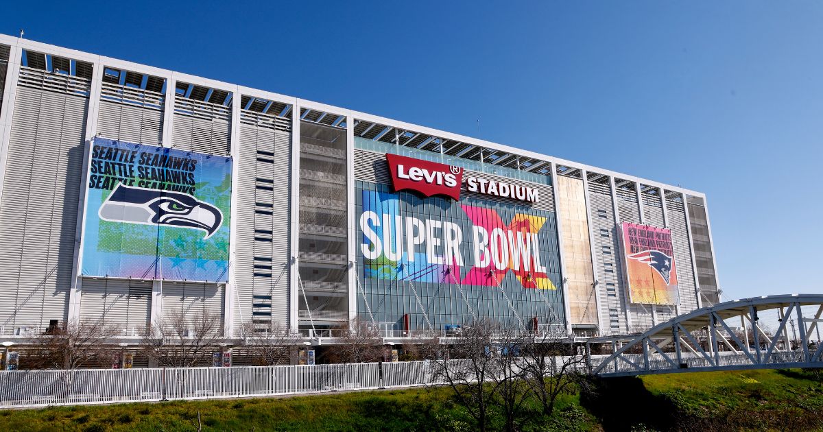 Seattle Seahawks and New England Patriots banners are displayed at Levi's Stadium in advance of Sunday's Super Bowl LX in Santa Clara, California.