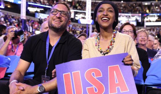 Rep. Ilhan Omar, a Minnesota Democrat, is seen attending the Democratic National Convention in August 2024 with her current husband, Tim Mynett.