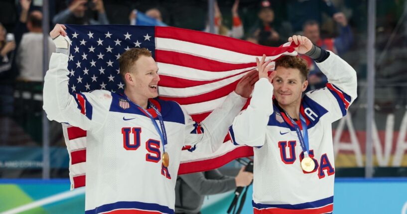 Brady Tkachuk #7 and Matthew Tkachuk #19 of Team United States celebrate their gold-medal win Sunday after the Men's Gold Medal match between Canada and the United States on day 16 of the Milano Cortina 2026 Winter Olympic games in Milan, Italy.