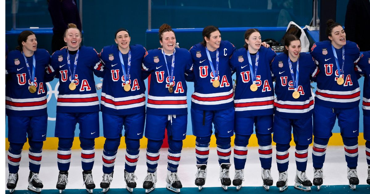 Refreshing Change: The Entire USA Women's Hockey Team Honored America by Standing for the National Anthem After Winning Gold Medal