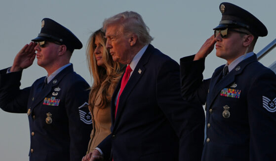 President Donald Trump and First Lady Melania Trump arrive on Air Force One at Palm Beach International Airport in West Palm Beach, Florida, on Feb. 13, 2026.