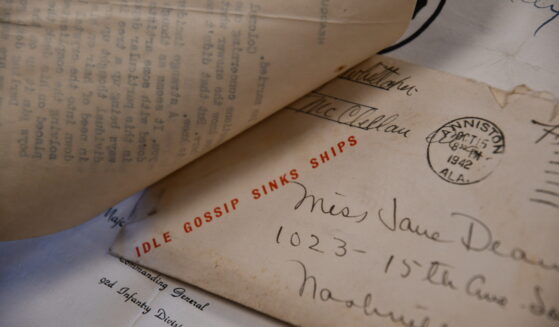 An envelope from a black soldier stationed in Alabama written to his wife in Nashville in 1942 shows a stamp that says "Idle Gossip Sinks Ships" in Nashville, Tennessee.