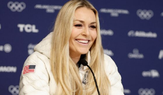 Skier Lindsey Vonn, grins while addressing a Tuesday news conference in Cortina d'Ampezzo, Italy.