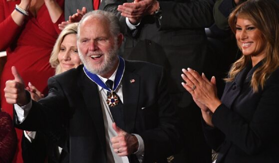 The late conservative giant Rush Limbaugh is pictured in a file photo giving a thumbs up after receiving the Presidential Medal of Freedom Feb. 4, 2020, during President Donald Trump's final State of the Union address of his first term.