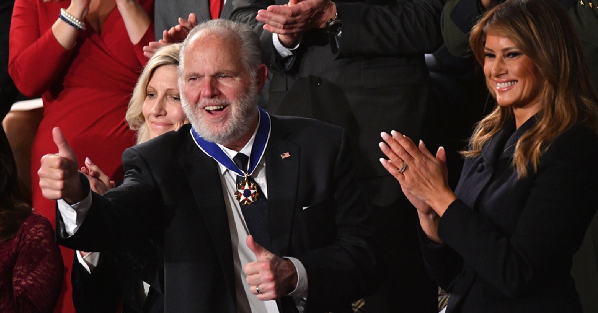 The late conservative giant Rush Limbaugh is pictured in a file photo giving a thumbs up after receiving the Presidential Medal of Freedom Feb. 4, 2020, during President Donald Trump's final State of the Union address of his first term.