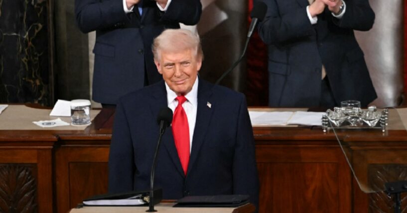 President Donald Trump gives a wry grin as he begins his State of the Union address Tuesday in the Capitol.
