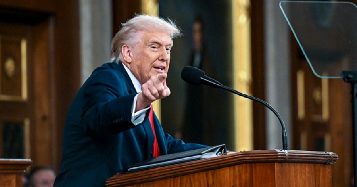 President Donald Trump points an accusing finger at the Democratic side of his audience during Tuesday's State of the Union address in the Capitol.