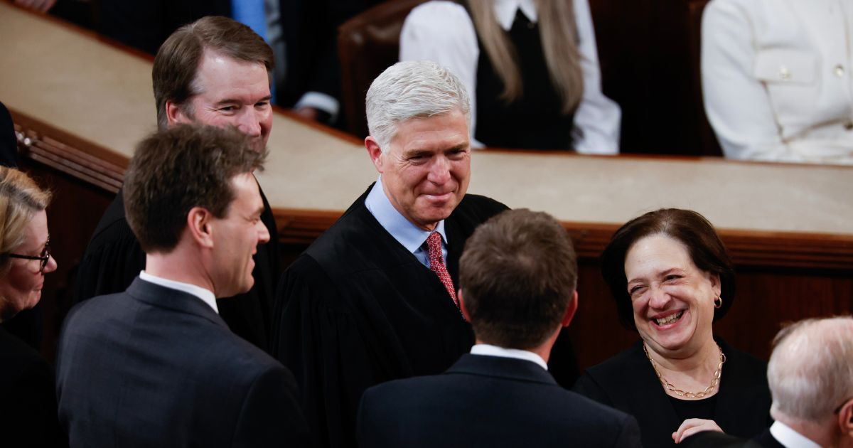 Supreme Court Associate Justices Brett Kavanaugh, Neil Gorsuch, and Elena Kagan arrive for President Joe Biden's State of the Union address during a joint meeting of Congress in the House chamber at the U.S. Capitol on March 7, 2024, in Washington, D.C.