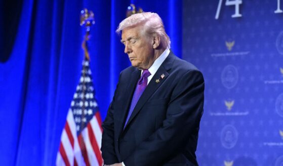 President Donald Trump bows his head in prayer during the National Prayer Breakfast at the Washington Hilton in Washington, D.C., on Feb. 5, 2026.