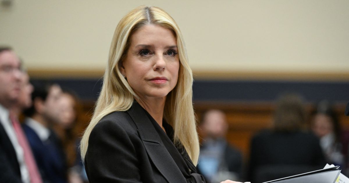 Attorney General Pam Bondi takes her seat before testifying before a House Judiciary Committee hearing on "Oversight of the Department of Justice" on Capitol Hill in Washington, D.C., on Feb. 11, 2026.