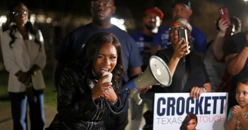 Rep. Jasmine Crockett speaks with supporters outside a polling station on Feb. 27, 2026, in Dallas, Texas.