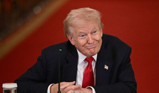 President Donald Trump listens during a roundtable to "save college sports" in the East Room of the White House in Washington, D.C., on March 6, 2026.