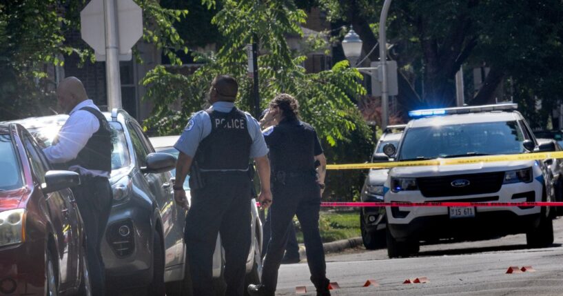 Police investigate the scene of a drive-by shooting on July 6, 2024, in Chicago, Illinois.