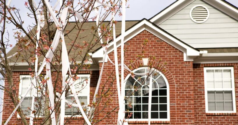 A suburban home is a victim of a teenage toilet papering prank.