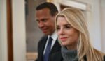 Attorney General Pam Bondi walks in with former professional baseball player Alex Rodriguez to attend an event for Inter Miami CF, winners of the 2025 Major League Soccer Cup, in the East Room of the White House in Washington, D.C., on March 5, 2026.