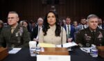 Director of National Intelligence Tulsi Gabbard prepares to testify during a Senate Intelligence Committee hearing on worldwide threats in the Hart Senate Office Building on March 18, 2026, in Washington, D.C.