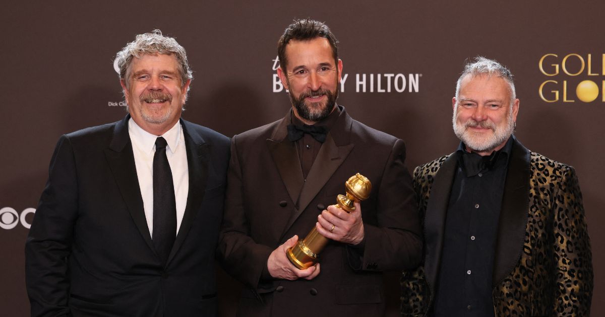Producer John Wells, actor Noah Wyle, and producer R. Scott Gemmill, winners of the Best Television Series - Drama Award for "The Pitt", pose in the press room during the 83rd annual Golden Globe Awards at the Beverly Hilton hotel in Beverly Hills, California, on Jan. 11, 2026.