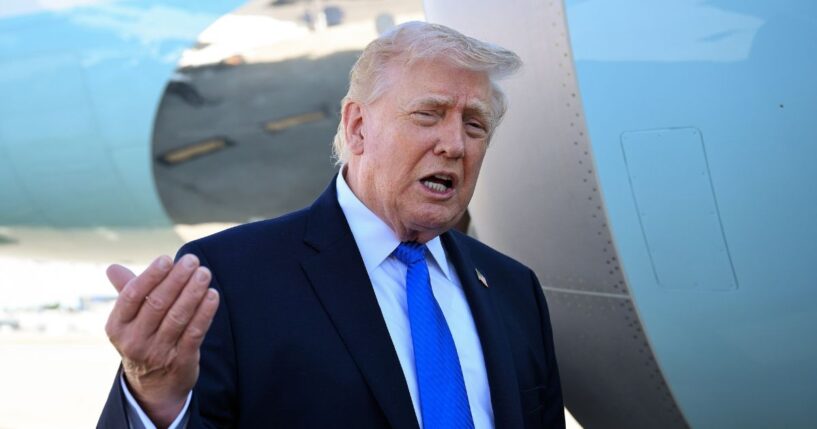 President Donald Trump speaks to reporters before boarding Air Force One at Palm Beach International Airport on March 23, 2026, in West Palm Beach, Florida.