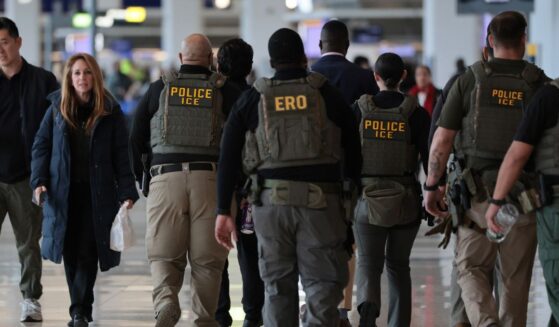 Immigration and Customs Enforcement agents patrol Terminal B at LaGuardia Airport on March 23, 2026, in New York City.