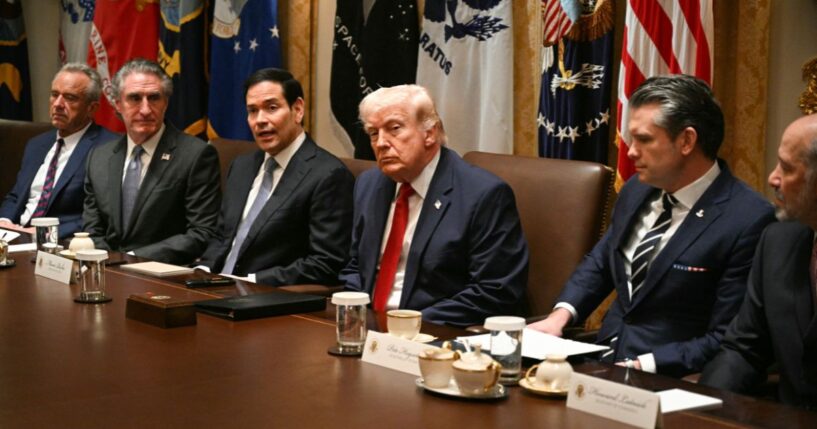 Secretary of State Marco Rubio, flanked by Health and Human Services Secretary Robert F. Kennedy Jr., Interior Secretary Doug Burgum, President Donald Trump, Defense Secretary Pete Hegseth, and Commerce Secretary Howard Lutnick, speaks during a Cabinet meeting in the Cabinet Room of the White House in Washington, D.C., on March 26, 2026.