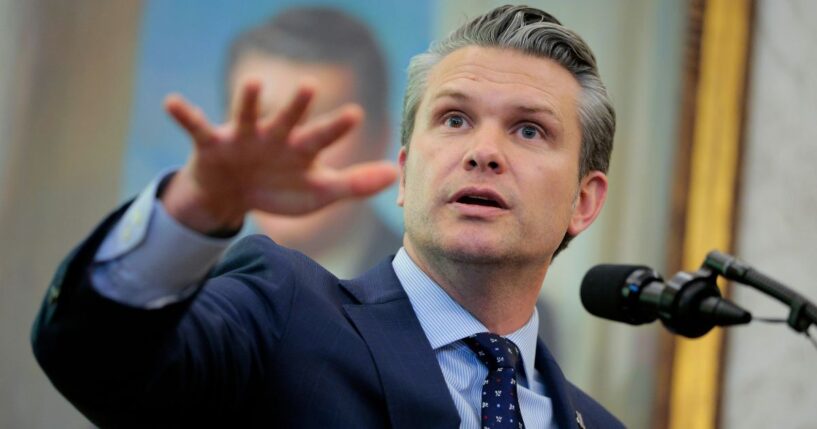 Secretary of War Pete Hegseth answers questions in the Oval Office at the White House on March 24, 2026, in Washington, D.C.