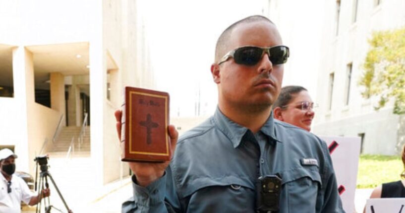 The Supreme Court ruled unanimously in favor of Christian street preacher Gabriel Olivier, seen holding a Bible during a 2022 anti-abortion protest at Hinds County Chancery Court in Jackson, Mississippi.